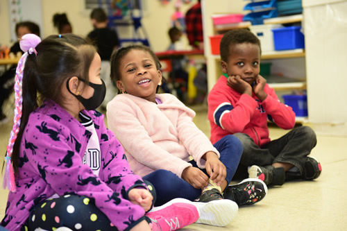 Children sitting on the floor